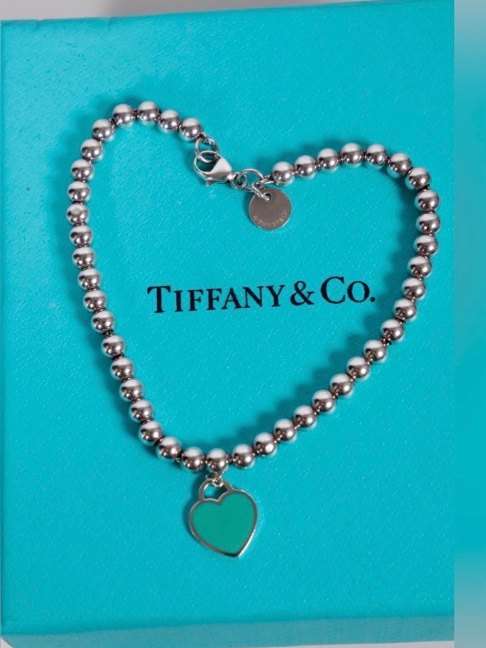 Return to Tiffany® Heart Tag Bracelet in Silver by Tiffany & Co.
length 7” - Picture 3 of 6